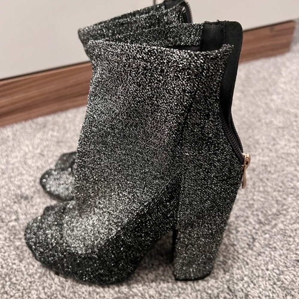 Shimmering Black Heeled Boots